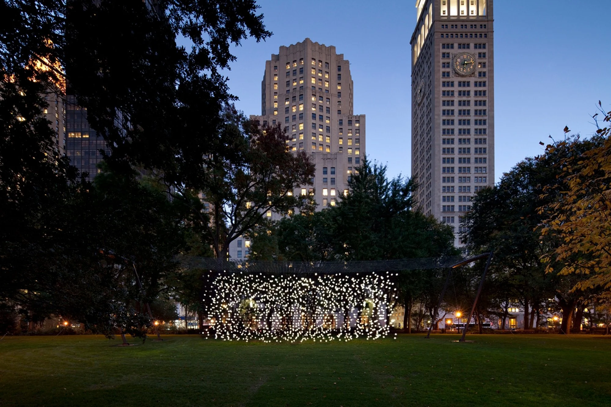 A field of hanging bulbs turns into a crowd if you stand in the right place